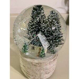 SNOWY FARMHOUSE SNOW MUSICAL GLOBE on Faux WOODEN STUMP